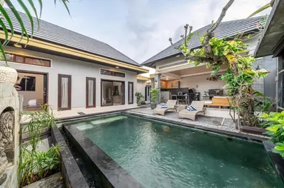 a swimming pool in the backyard of a villa at QLO Villa , Seminyak in Seminyak