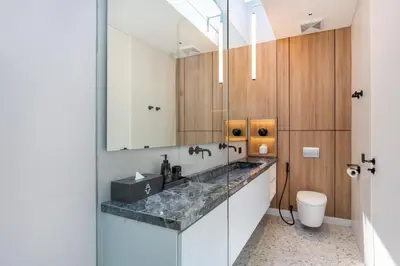 a bathroom with a sink and a mirror at Alex Villas Complex N5 in Canggu