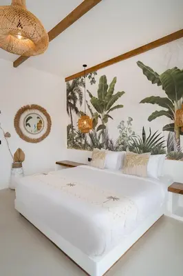 a white bedroom with a large white bed at Villa Casa Gaia 6 by BaliSuperHost in Kerobokan