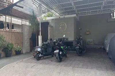 a group of motorcycles parked in a garage at Ranala Coliving in Seminyak