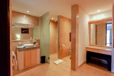 a bathroom with a sink and a shower at The Springs Villas Jimbaran in Jimbaran