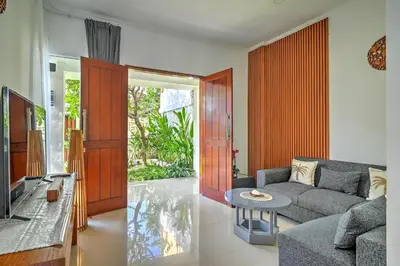 a living room with a couch and a table at PRIVATE 3BR - Yash Villa at Seminyak in Kerobokan
