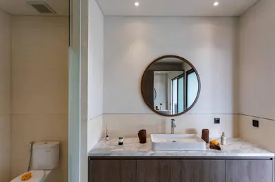 a bathroom with a sink and a mirror at Pristine & Modern Gem Luxury 3bd Villa in Umalas in Kerobokan