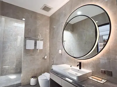 a bathroom with a sink and a mirror at Bellagio Villas in Seminyak