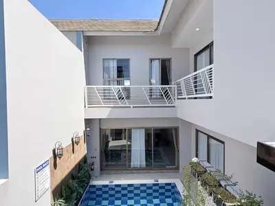 a view of a house with a swimming pool at Bellagio Villas in Seminyak