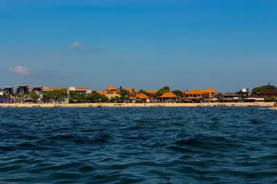 a view of a beach with a resort in the background at Bali Mega Hotel in Jimbaran