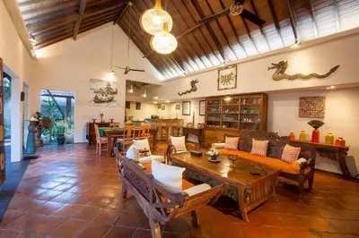 a large living room with couches and tables at Villa Chantal-Intimate Villa in Seminyak in Seminyak