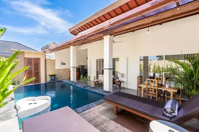 an image of a villa with a swimming pool at Rumah Kodel in Legian in Seminyak