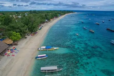 an aerial view of a beach with boats in the water at Sol Bella Villa 3 in Seminyak