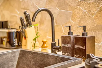 a kitchen sink with a kitchen faucet at Villa Chicago Brand new 7 BDR private pool in Seminyak