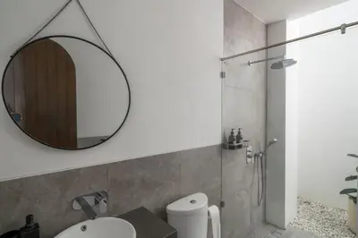 a bathroom with a sink and a mirror at Villa Adela 1 Berawa 3BR Villa Near Atlas, Finns Beach Clubs in Canggu