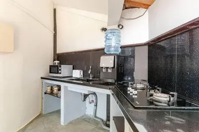 a kitchen with a counter top with a microwave at Sunset view apartment in Nusa Dua in Nusa Dua