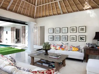 a living room with a white couch and a table at Villa Adasa by Elite Havens in Seminyak