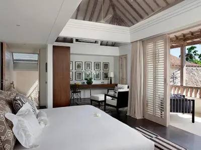 a bedroom with a bed and a living room at Villa Adasa by Elite Havens in Seminyak