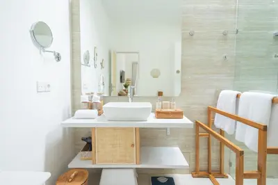 a bathroom with a sink and a mirror at Casa Elias Seminyak in Seminyak