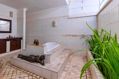 a bathroom with a bath tub and a tub at Onkita 4 BR Private Pool Villa ZN254 in Seminyak