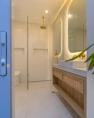 a bathroom with a sink and a mirror at Arunika Prime Villa in Seminyak