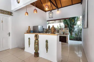a kitchen with a counter with artifacts on it at Villa Jasmin Seminyak in Seminyak