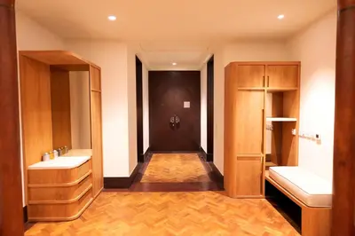 a bathroom with two sinks and a toilet in it at 1BR Suite Ocean View in Seminyak