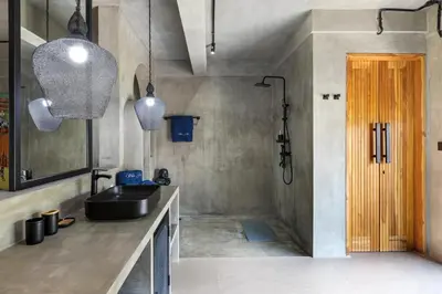 a bathroom with a sink and a shower at Atelier 1Br Villas in Seminyak in Seminyak