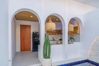 a kitchen with arches and a cactus in a room at T&J3 - New! Romantic 1BR pool villa in Umalas