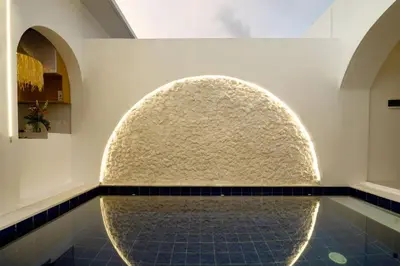 a bathroom with a large stone sink in a wall at T&J5 - New! Romantic 1BR pool villa, walk to beach! in Umalas
