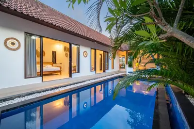 an image of a villa with a swimming pool at Free pick-up Balinese style tropical private pool villa with 2 bedrooms in Seminyak