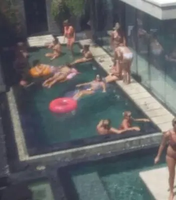 a group of people in a pool with a frisbee at Le Retreat Canggu, 3BR Luxury Villa, Bali's Best Location in Canggu