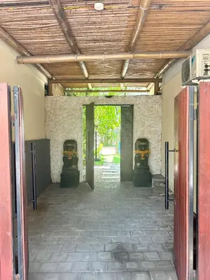 an entrance to a building with a door open at Villa Malya 5 bedrooms Seminyak in Seminyak