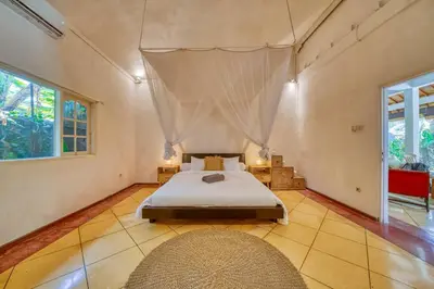 a bedroom with a bed in a room at Villa Sabi 3BR in the Heart of Seminyak by Santi Management in Seminyak