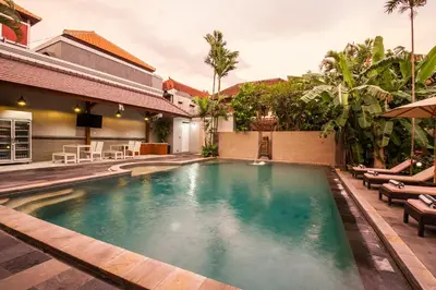 a swimming pool in the middle of a house at 10-BR Private Pool Legian Villa 5-Min Walk to Beach and Shops in Seminyak