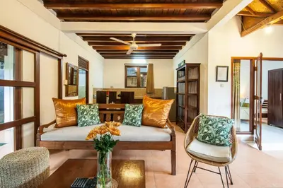 a living room with a couch and chairs at 6-BR Garden Legian Villa 5-Min Walk to Beach and Shops Bali in Seminyak