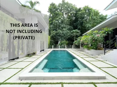 a swimming pool in front of a house with the words this area is not including at Villa EM Umalas by Satran Villa in Kerobokan