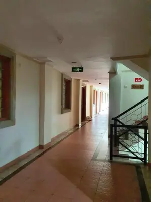 an empty hallway with a staircase in a building at C&C Apartment Jayakarta Residence Legian Bali A 6319 in Seminyak