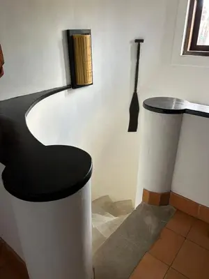 a room with a black and white toilet in a room at Timang Villa, Jimbaran-Bali in Jimbaran