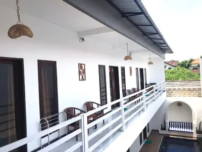 a view of the balcony of a house at Double D Guesthouse and Villa in Kerobokan