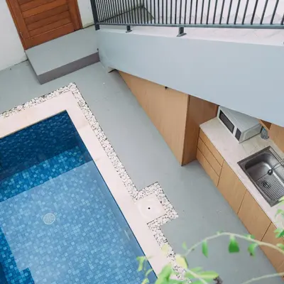 an overhead view of a swimming pool in a house at The Lavana Nakula Villa Kuta Sunset in Kuta