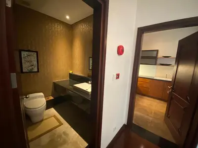 a bathroom with a toilet and a sink at Bintang Bali Villa in Kuta
