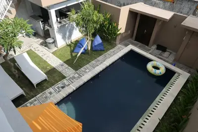 an overhead view of a swimming pool in a backyard at Family Villa with Private Pool in Central Seminyak in Seminyak