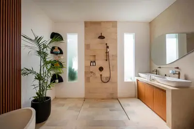 a bathroom with a sink and a shower at Villa Soluna Luxury 4BD Villa with Pool & Zen Vibes in Seminyak