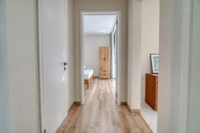 an empty hallway with a bedroom and a door at Nirvana Villa 3BR Brand New in Umalas, Canggu in Kerobokan