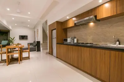 a kitchen with a sink and a counter top at Volare villa in Seminyak