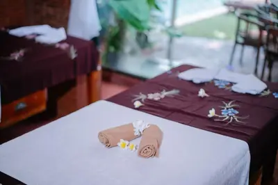 a couple of towels sitting on top of a table at The Saharah Mirage Bali in Kuta