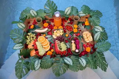 a bunch of fruits and vegetables on a table at The Medusa Villas Bali in Seminyak