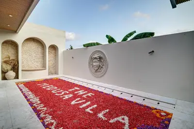 a red carpet with the words my wedding anniversary on it at The Medusa Villas Bali in Seminyak