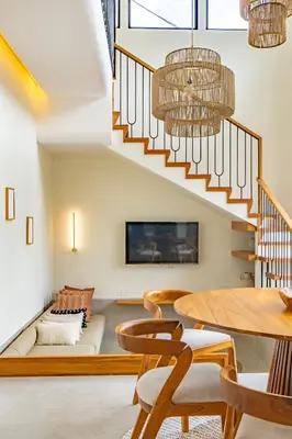a living room with a couch and a table at Casa Samudra - 3BR Villa in Seminyak in Seminyak