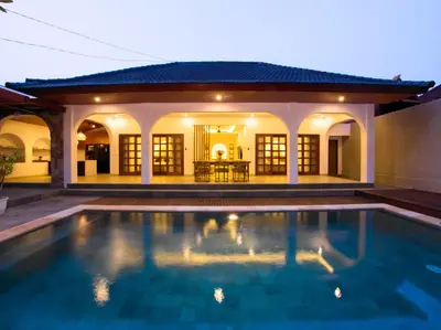 an image of a house with a swimming pool at Near Beach Villa in Seminyak