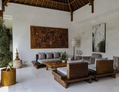 a living room with a couch and a table at Villa Chocolat Seminyak 2 Bedroom in Seminyak
