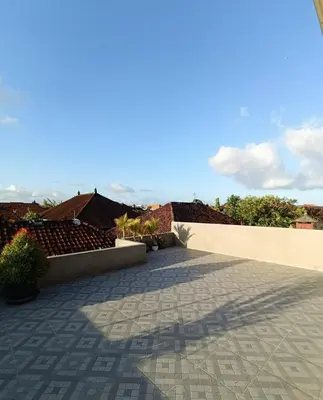 a view of a patio of a house at Room Hangtuah Sanur in Kuta