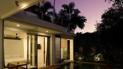 a house with a living room and a pool at Villa Sassy - Stunning Private Award Winning Seminyak Oasis in Seminyak